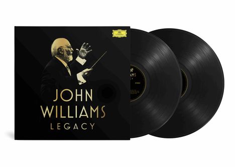 Text: "JOHN WILLIAMS LEGACY". Cover zeigt einen Dirigenten mit erhobener Hand und Taktstock; daneben zwei Schallplatten.