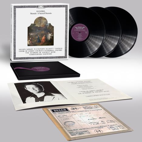 „HANDEL Messiah: A Sacred Oratorio“ auf einer Schallplattenbox, daneben mehrere schwarze Schallplatten und ein Heft mit Foto.