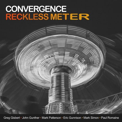"CONVERGENCE RECKLESS METER" in weißen und orangen Buchstaben über einem bewegten Karussell. Liste von Namen darunter.