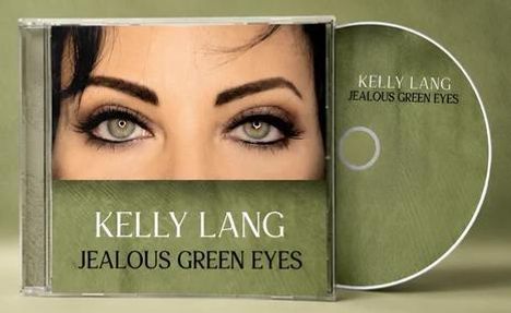Text: "KELLY LANG JEALOUS GREEN EYES". Ein Albumcover mit grünem Hintergrund und Augen, die prominent abgebildet sind.