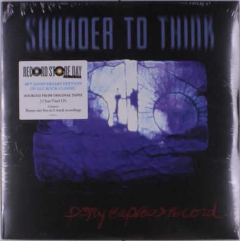 Text: "SHUDDER TO THINK", "20th ANNIVERSARY EDITION...". Illustration einer stilisierten Figur vor violettem Hintergrund.