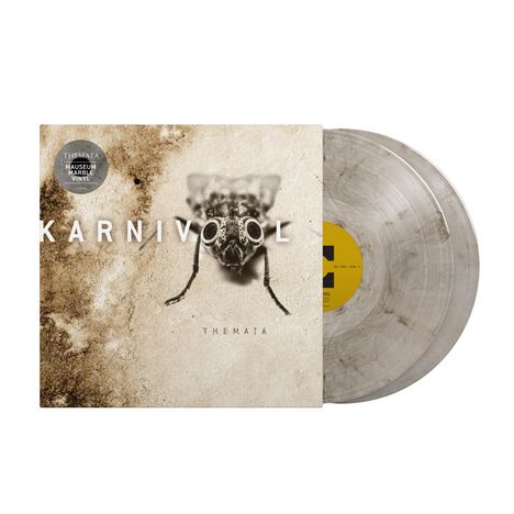 Text: "KARNIVOOL THEMATA" und "THEMATA MUSEUM MARBLE VINYL". Eine abstrakte Illustration einer Insektenkopfansicht.