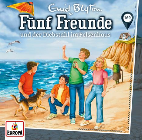 "Enid Blyton: Fünf Freunde und der Diebstahl im Felsenhaus" ist der Text. Vier Kinder, ein Hund am Strand.