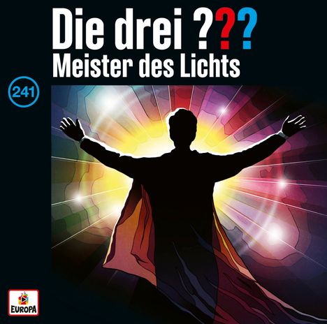"Die drei ??? Meister des Lichts" in großen Buchstaben, darunter ein Mann mit ausgebreiteten Armen vor bunten Lichtern.