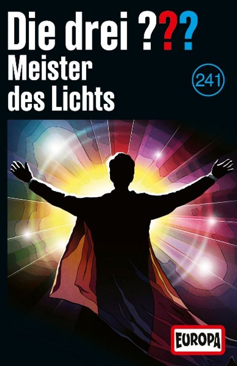 „Die drei ??? Meister des Lichts“. Silhouette mit offenen Armen vor bunten Lichtstrahlen. Europa-Logo unten.