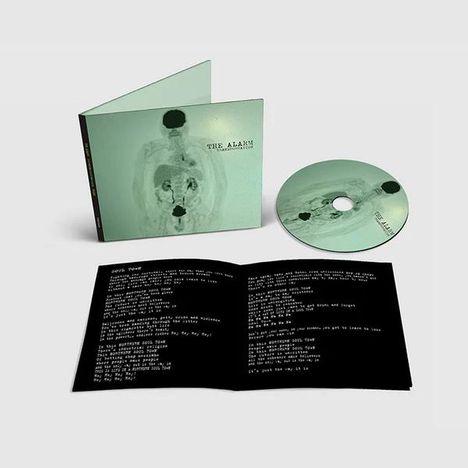 CD-Cover mit der Aufschrift "THE ALARM" und einer abstrakten Illustrator-Grafik; daneben eine geöffnete Hülle und eine CD.