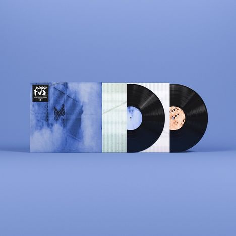 Das Bild zeigt Schallplatten mit blauen und Mustern bedeckten Hüllen. Oben links steht: "the-analog-v2".