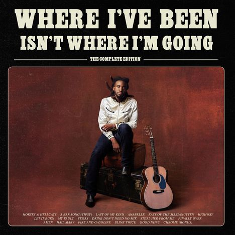 "WHERE I'VE BEEN ISN'T WHERE I'M GOING" und "THE COMPLETE EDITION" in großen Lettern. Ein Mann sitzt mit einer Gitarre.