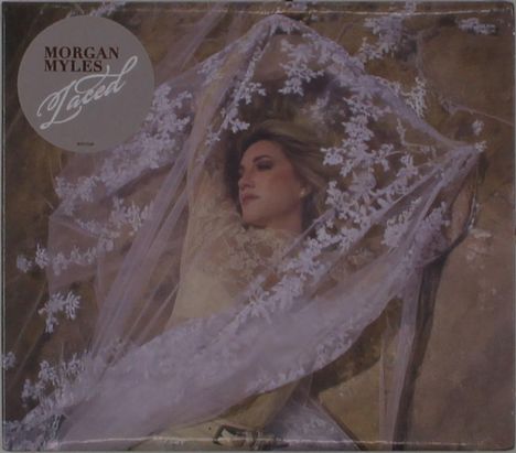 "MORGAN MYLES, Laced" in stilisierter Schrift. Eine Frau liegt unter besticktem, transparentem Stoff.