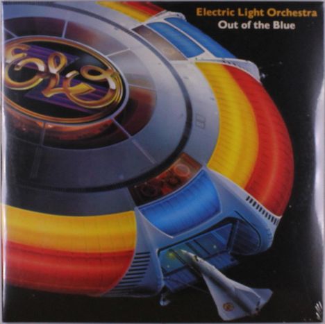 "Electric Light Orchestra Out of the Blue" oben rechts. Große runde Raumstation mit bunten Segmenten und einem Raumschiff. 