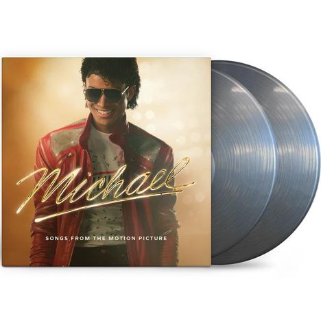 Text: "Michael" in geschwungener Schrift, darunter "SONGS FROM THE MOTION PICTURE". Ein lächelnder Mann in roter Jacke.