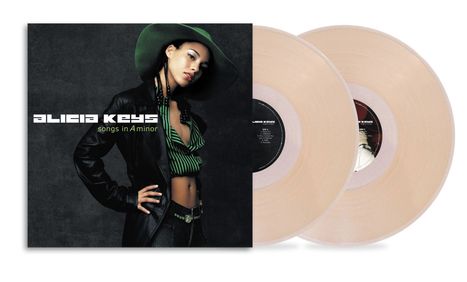 Text: "Alicia Keys, songs in A minor." Frau in grünem Hut und gestreiftem Oberteil. Zwei transparente Vinyl-Schallplatten.