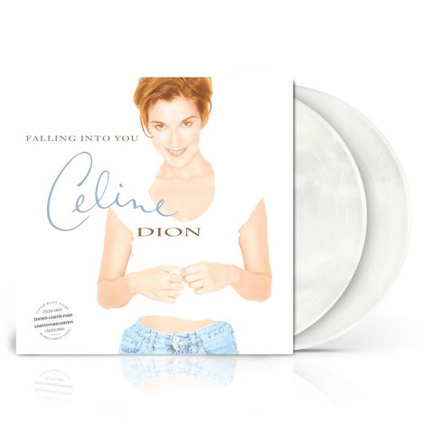 Text: "Falling Into You", "Céline Dion", weiße Schallplatten zu sehen. Frau in Top und Jeans lächelt leicht.