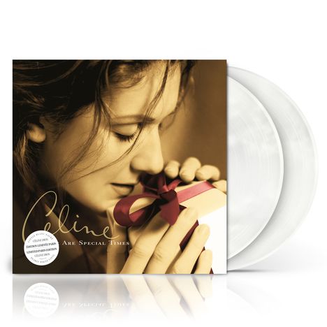 Text: "Celine", "These Are Special Times", "Limited Edition". Schwarz-weiß Foto von Frau mit Geschenk und weißen Schallplatten.