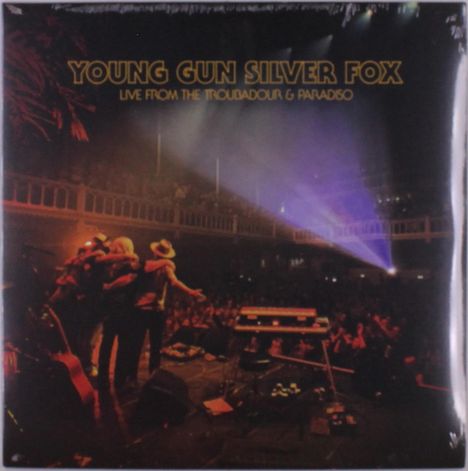 Text: "YOUNG GUN SILVER FOX LIVE FROM THE TROUBADOUR & PARADISO." Eine Bühne mit Personen und Publikum dahinter.