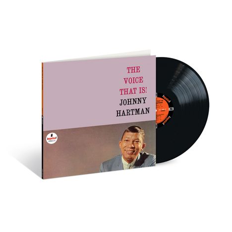 "THE VOICE THAT IS! JOHNNY HARTMAN" auf einem Albumcover, darunter ein lächelnder Mann in Anzug mit einer Schallplatte.