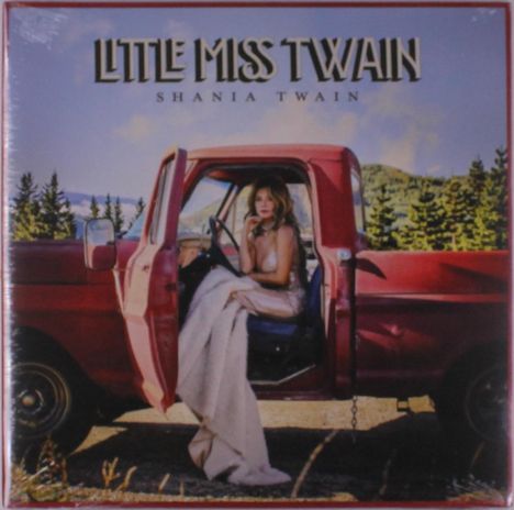 Oben steht "LITTLE MISS TWAIN" und darunter "SHANIA TWAIN". Eine Frau sitzt in einem roten Truck vor Berglandschaft.