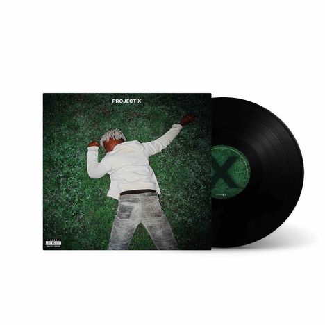 "PROJECT X", ein Mensch in weißem Outfit liegt auf Gras. Vinyl-Schallplatte, schwarzes Vinyl mit grünem Etikett.