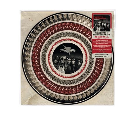"Tom Petty and Heartbreakers No Sleep Till L.A. Limited Edition Zoetrope Vinyl." Kreisförmige Abbildungen und Bandfoto.