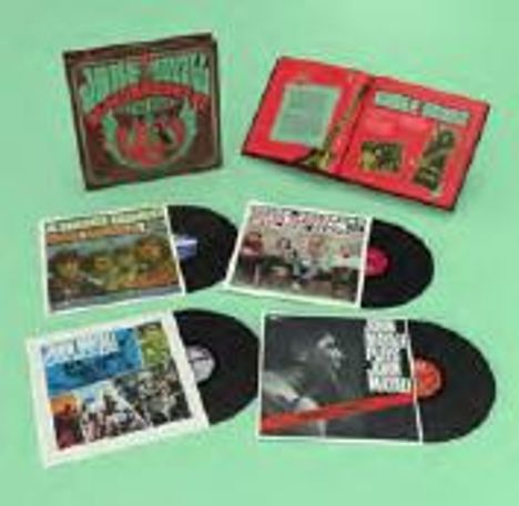 Fünf Schallplatten mit bunten Covern, ein geöffnetes Album. Texte sind nicht gut lesbar. Hintergrund ist hellgrün.