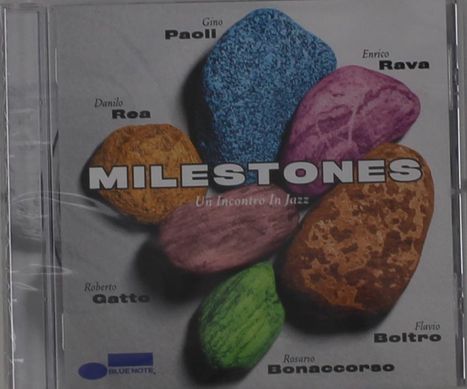 Texte: "MILESTONES", "Un Incontro In Jazz". Bunte Steine, Künstlernamen darum platziert. Blue Note Logo unten.