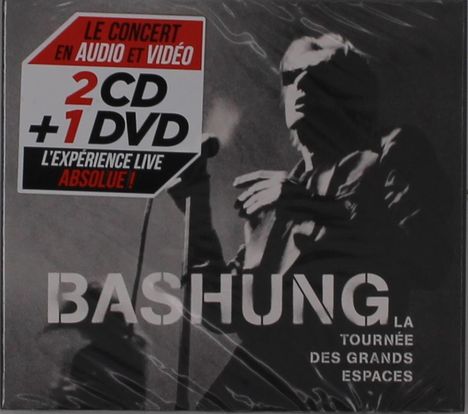 Aufklebertext: "Le concert en audio et vidéo, 2 CD + 1 DVD, L'expérience live absolue!" Schwarz-weiß Foto eines Sängers.