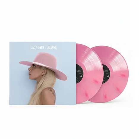 Text: "LADY GAGA / JOANNE". Ein Albumcover mit einer Profilansicht einer Person mit rosa Hut, zwei pinke Vinyl-Schallplatten.
