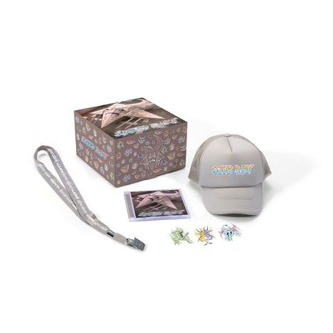 Box mit buntem Aufdruck, Mütze mit Schriftzug "Speedy Wunderground", Lanyard und kleine bunte Figuren.
