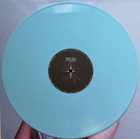 Der Text in der Mitte lautet: "MEG MAC IT'S MY PARTY". Eine hellblaue Schallplatte wird von einer Hand gehalten.
