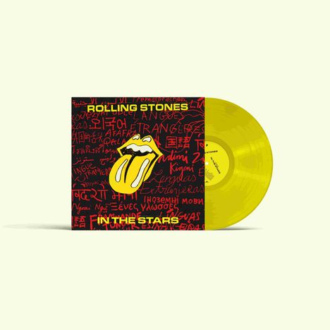 "Rolling Stones", "IN THE STARS" auf schwarzem Hintergrund, gelbe Vinyl-Schallplatte. Zunge-Logo in der Mitte.