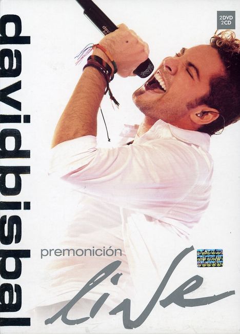"David Bisbal, premonición live". Mann singt leidenschaftlich mit Mikrofon, trägt Armbänder.