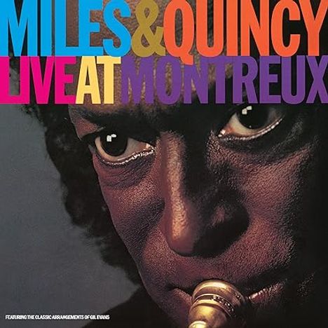 Text: "MILES & QUINCY LIVE AT MONTREUX". Nahaufnahme eines Gesichts, das eine Trompete spielt, konzentrierter Ausdruck.