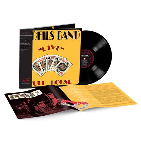 "GEILS BAND 'LIVE' FULL HOUSE" auf gelbem Hintergrund mit Spielkarten. Schallplatte und Booklet mit Bandfotos, innen liegend.