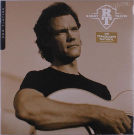 "Now Playing" und "On Translucent Tan Vinyl". Ein Mann mit Gitarre, schaut ernst. Sepia-Farbtöne.