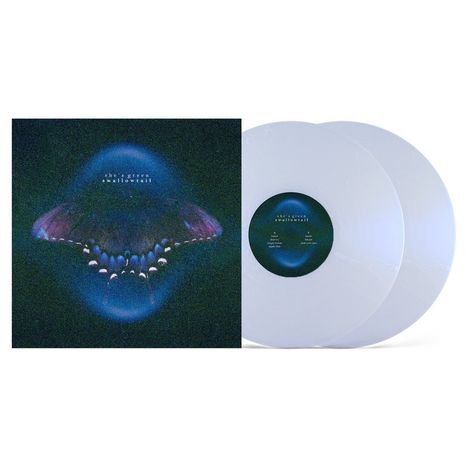 Text: "she's green swallowtail". Zwei weiße Vinyl-Schallplatten und ein Cover mit einem Schmetterlingsbild darauf.