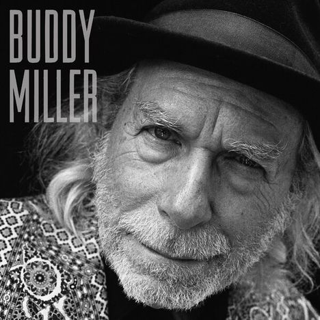 Text: "BUDDY MILLER". Ein älterer Mann mit Bart und Hut blickt freundlich in die Kamera; er trägt eine gemusterte Jacke.