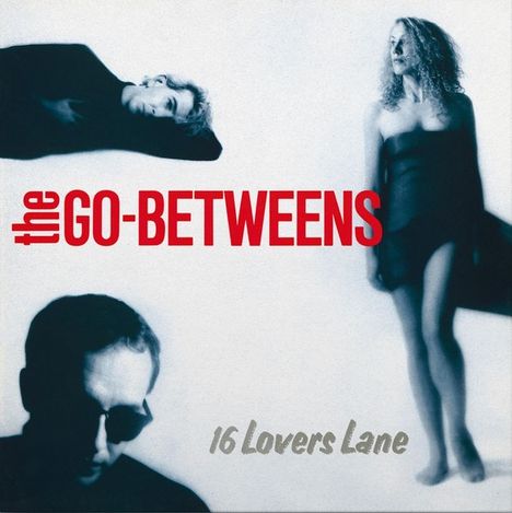 Text: "the GO-BETWEENS", "16 Lovers Lane". Cover mit drei Personen und einer Schallplatte.
