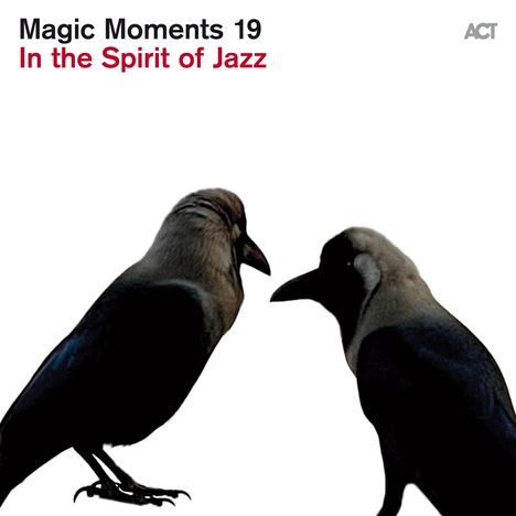 Text: "Magic Moments 19 In the Spirit of Jazz". Zwei schwarze Vögel, die einander zugewandt sind auf weißem Hintergrund.