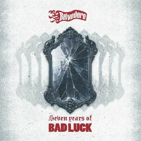 „Seven years of BAD LUCK“ in roter und schwarzer Schrift, zerschlagener Spiegel, mehrfach gespiegelt, und rotes „Belvedere“ Logo oben.