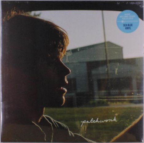 Text: "patchwork", "SEA BLUE VINYL". Ein Silhouettenprofil einer Person vor einem Gebäude im Hintergrund.