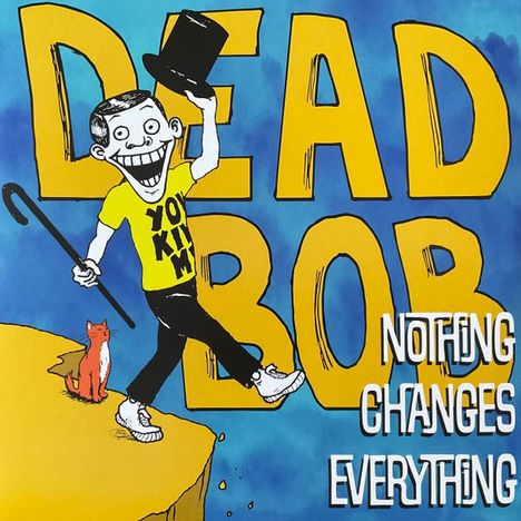 "YOKIM DEAD BOB NOTHING CHANGES EVERYTHING." Ein fröhlicher Charakter mit Zylinder und Stock balanciert auf einem Felsvorsprung, Katze dabei.