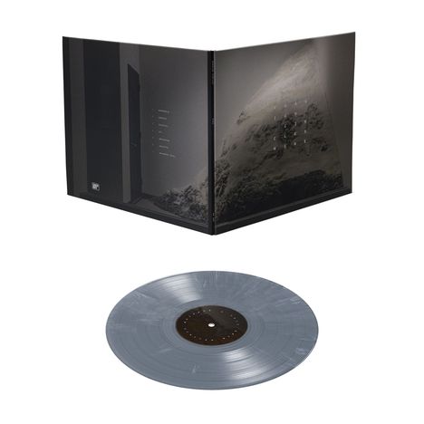 Auf der linken Seite steht: "Desiderii Margin In Thule". Auf der Hülle ist ein Berg abgebildet, darunter eine graue Vinyl-Schallplatte.
