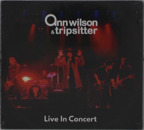 Text: "Ann Wilson & Tripsitter" und "Live In Concert". Eine Band auf der Bühne mit roter Beleuchtung.