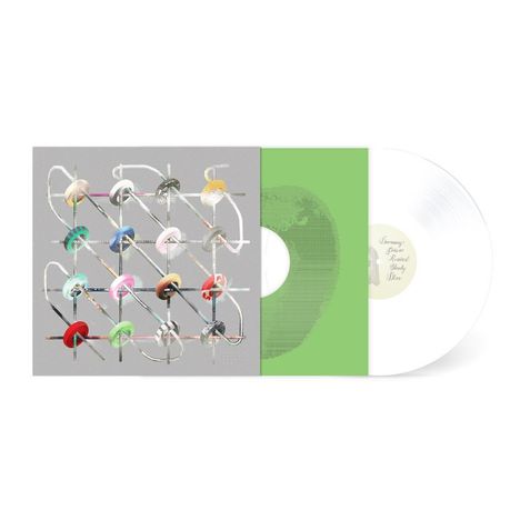 Texte: "Heavenly Divine Spiritual Lovely Dior". 
Eine weiße Vinyl-Schallplatte steckt teilweise in einem 
grünen Cover, das daneben liegt.