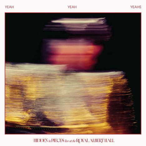 Texte: "YEAH YEAH YEAHS", "HIDDEN in PIECES live at the ROYAL ALBERT HALL". 
Bild: Verschwommene farbige Lichtstreifen.