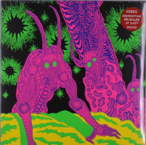 Oben rechts: "OSEES Abomination Revealed At Last DGG06". Illustration mit zwei pinken Kreaturen, grün und schwarz.
