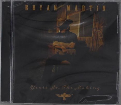 Oben: "BRYAN MARTIN". Unten: "Years In The Making". Ein Mann sitzt in einem düsteren Raum.