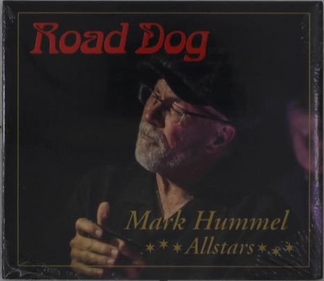 "Road Dog", "Mark Hummel Allstars". Älterer Mann mit Bart und Mütze spielt Mundharmonika.
