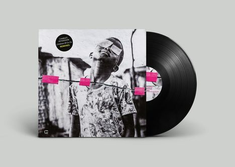 Text "Charles Petersohn Children Of Zu Zu Remixes". Eine Schallplatte und ein Cover mit einem Jungen in Schwarz-Weiß.