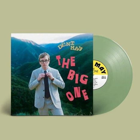 Texte: "DENT MAY", "THE BIG ONE". Ein Mann in Anzug vor einer Berglandschaft. Grüne Schallplatte rechts.